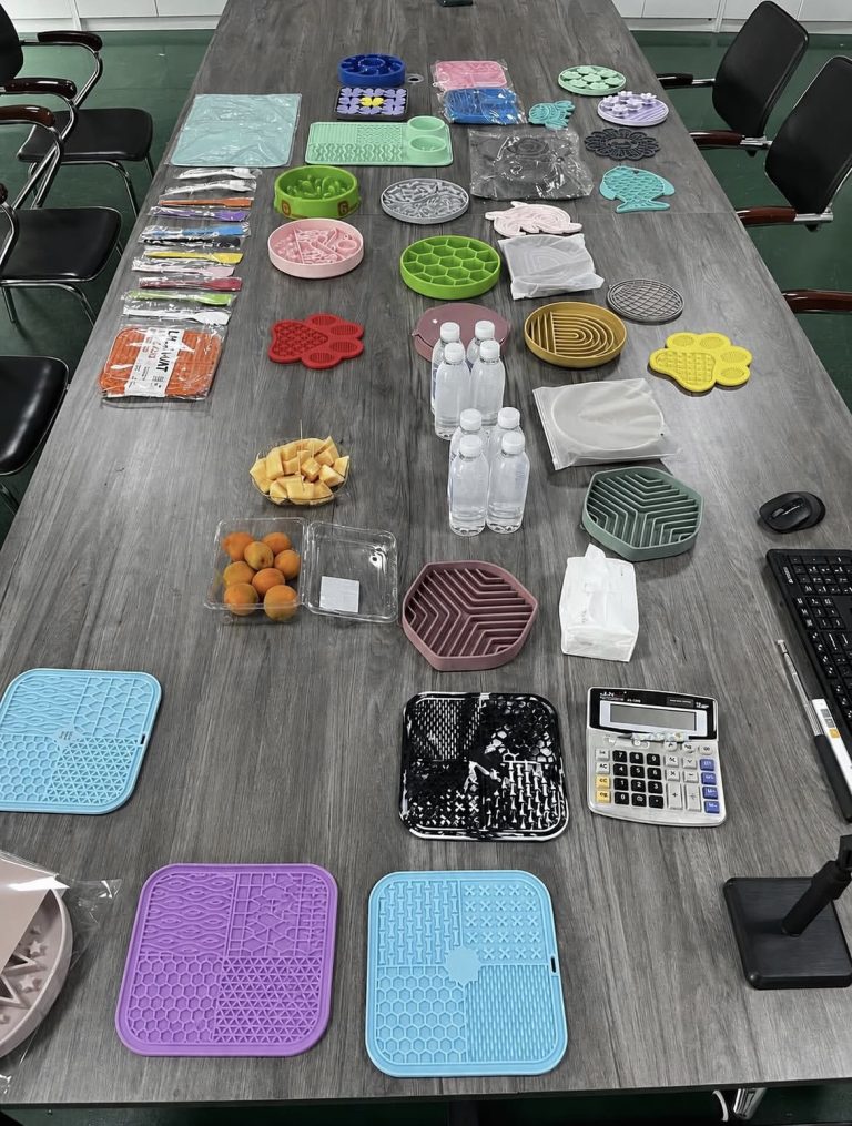 A meeting room showing how we hace team meetings discussing about silicone dog slow feeders and lick mats